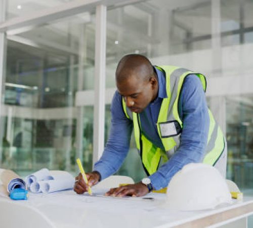 Serious architecture man drawing blueprint lines with design process, planning development and builder project tools. Floor plan construction and focus of engineer black person or business contractor